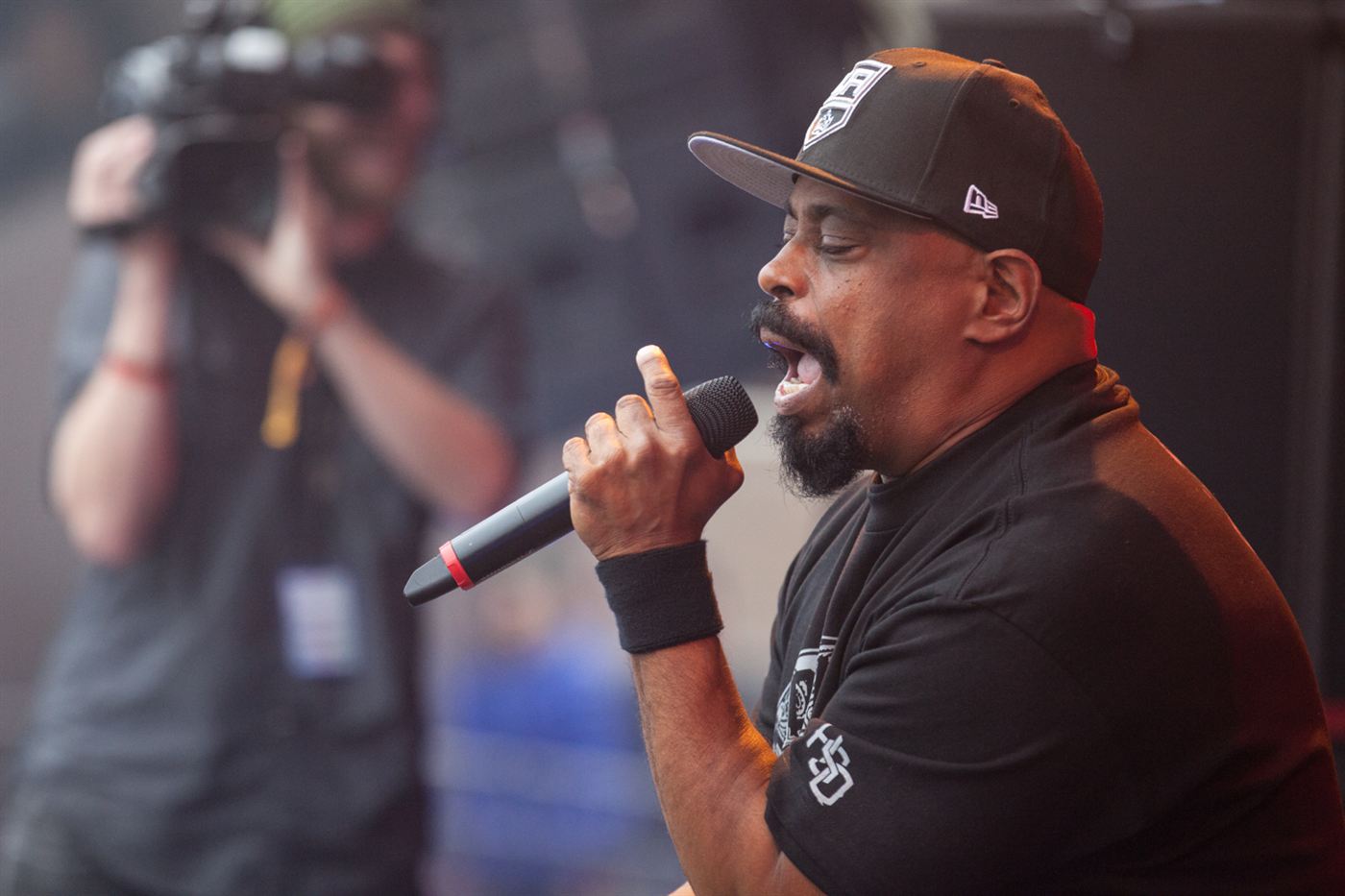 Sen Dog of Cypress Hill performing live on stage during a concert.
